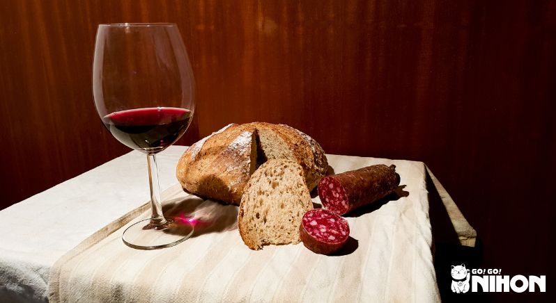 Meat and wine on table are examples of what not to bring to Japan.