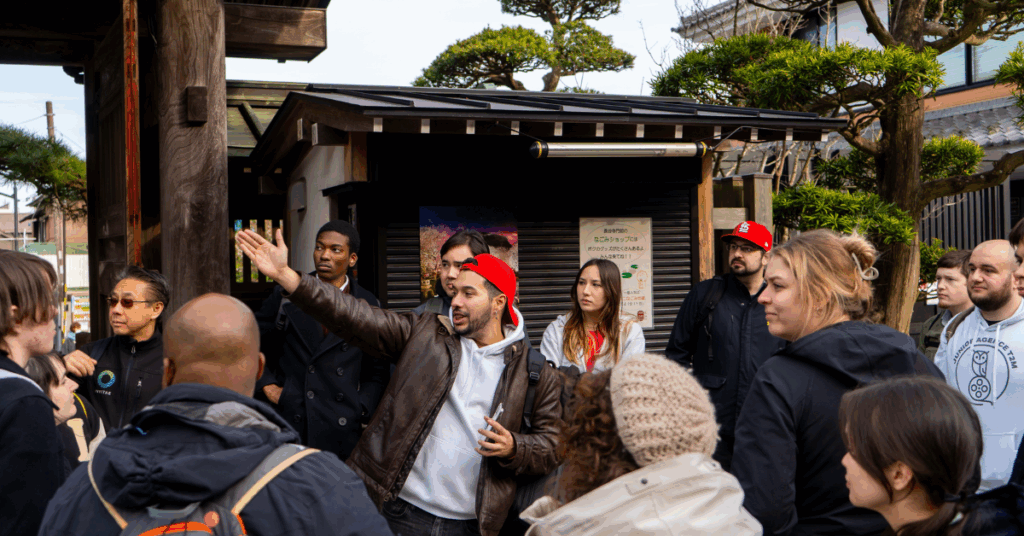 Go! Go! Nihon’s Tour Leader, Jose leading a group of study trippers in Kamakura and Enoshima