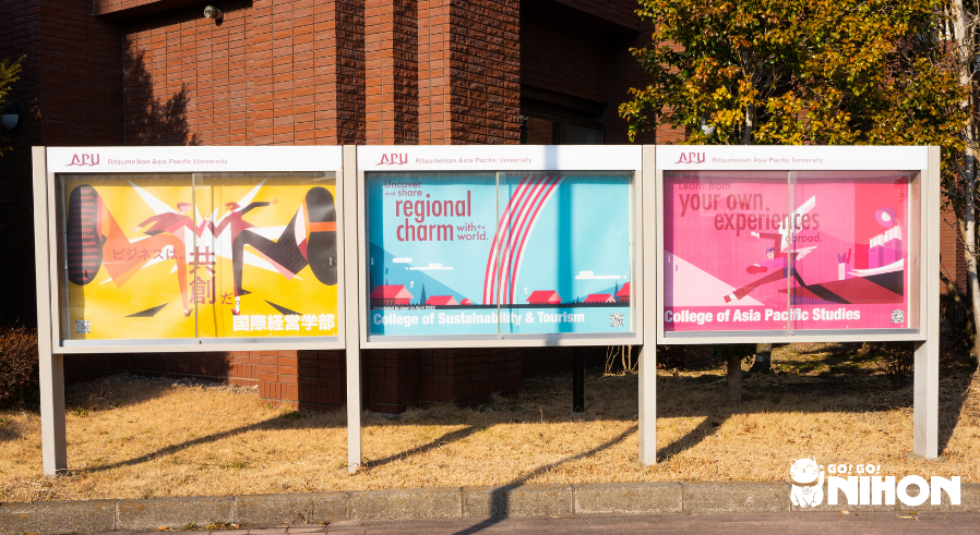 three signs on APU campus about the different colleges of sustainability and tourism and asia pacific studies