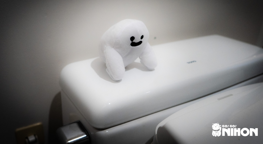 little cute ghost on haunted toilet seat