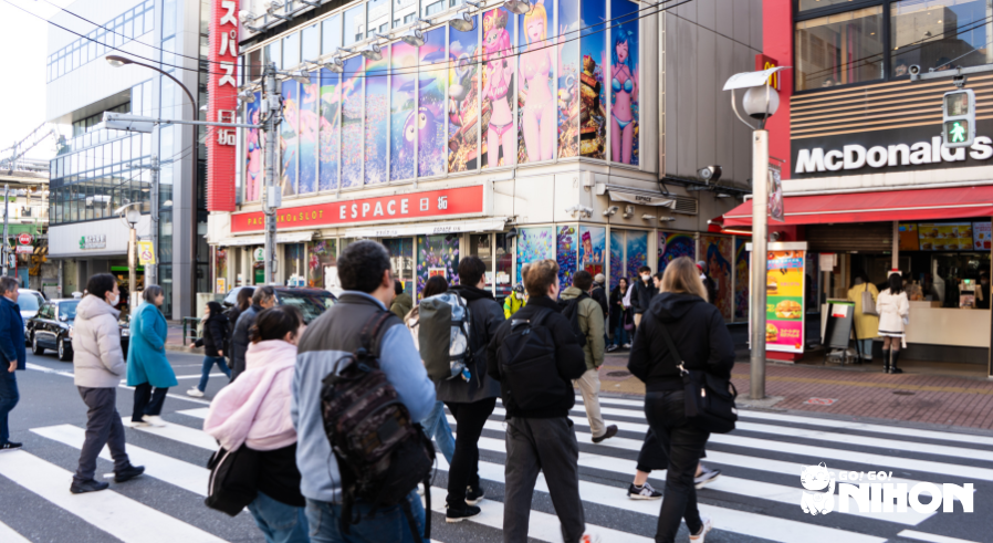group of people crossing the street