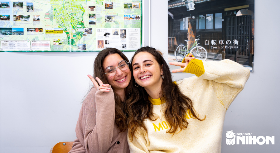 Two happy students at a Japanese language school.