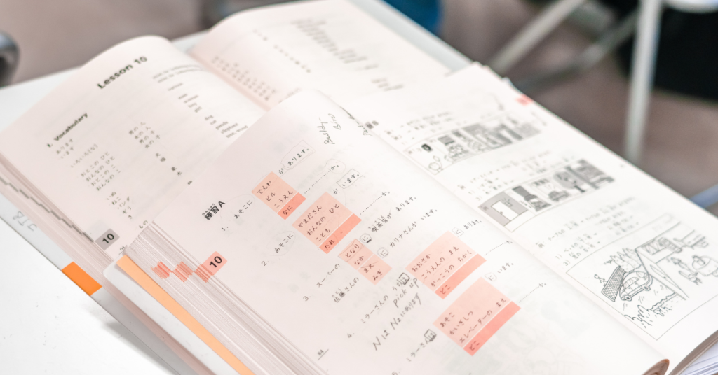 two Japanese textbooks on a desk