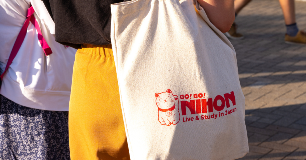 woman with a go go nihon totebag