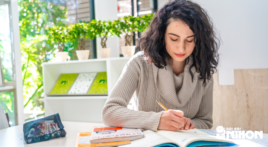 A student studying at a desk