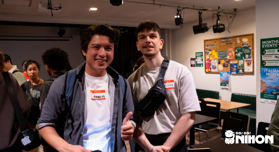 Two new April students at a welcome event