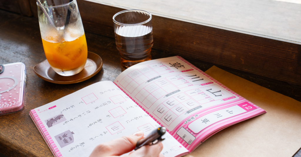 pink japanese textbook flat lay