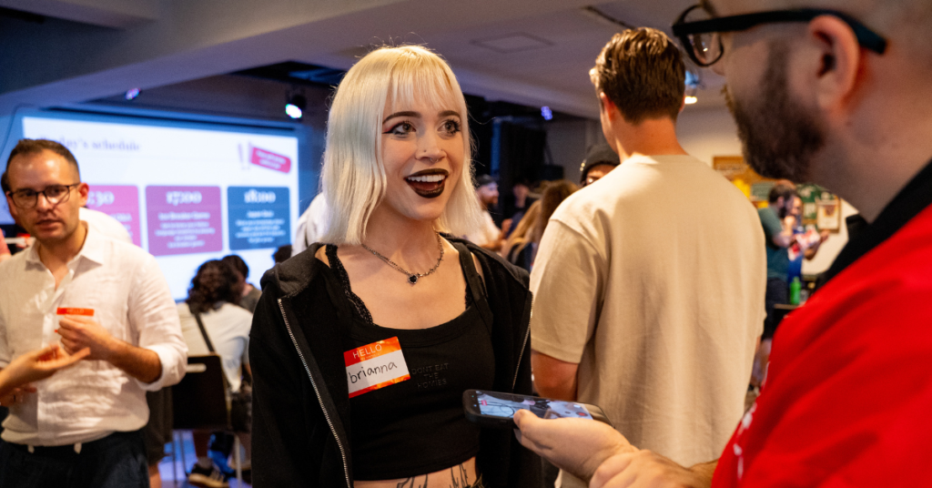 an American student at a welcome event being interviewed